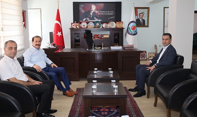 Eski Dinar Belediye Başkanı Mustafa Tarlacı, Kaymakam Hasan Uğuz'u Ziyaret Etti